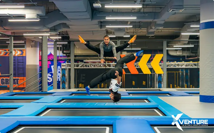 Visitors jumping on the trampoline at Xventure indoor sports park in Chiang Mai