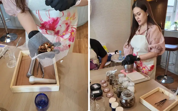 Instructor demonstrating how to make the Thai herb inhaler at a workshop in Bangkok