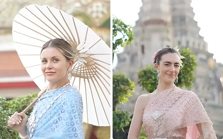 People posing for photos at Wat Arun in Bangkok