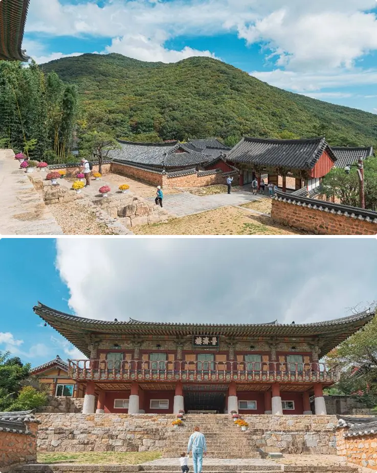 Beomeosa Temple's historic halls sit nestled against Geumjeongsan's lush green mountain backdrop.