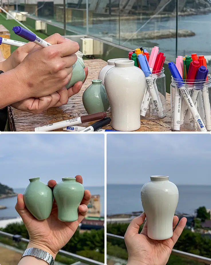 Decorate full-size and mini ceramic vases with colorful pens beside the ocean.
