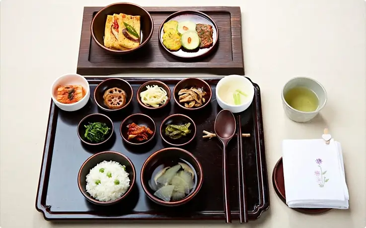 Traditional temple meal featuring seasonal banchan, rice, and soup served mindfully.