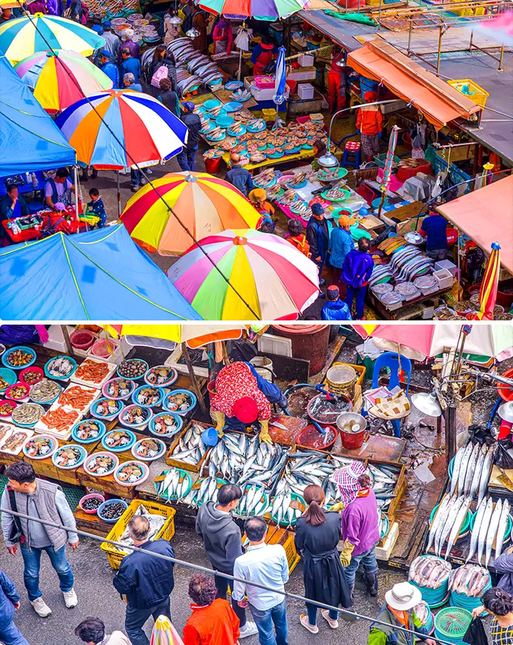 Aerial view of Jagalchi Market's vibrant seafood stalls with colorful umbrellas and fresh catches.