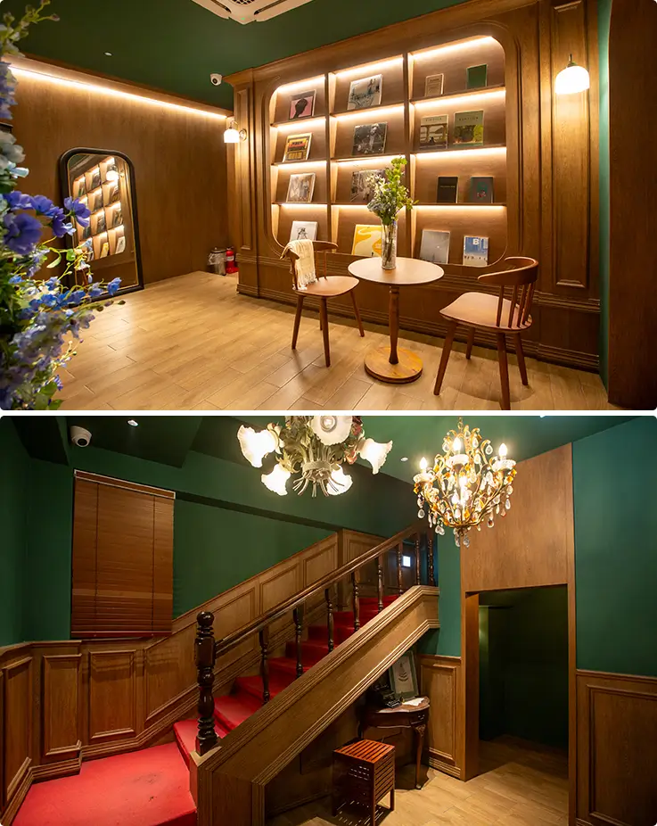 Cozy reading nook and grand red-carpeted staircase showcase the hotel's vintage character.