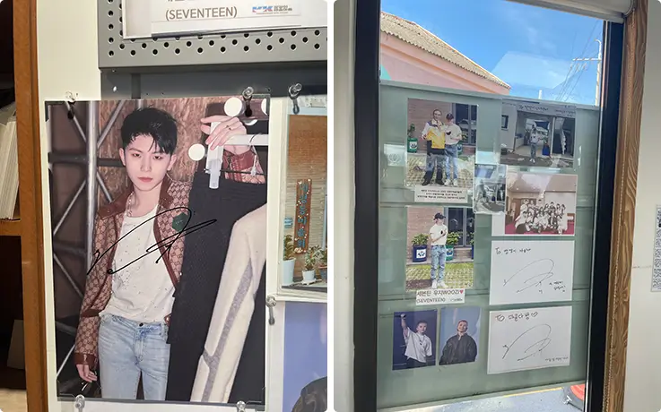 Signed celebrity photos, of SEVENTEEN woozi, decorate a charming local art village storefront.