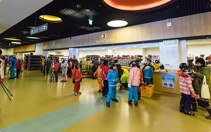 People renting ski equipments at Elysian Gangchon Ski Resort in Chuncheon
