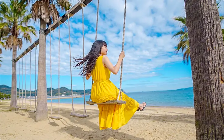 A person enjoying Palm Tree Swing in Fukuoka