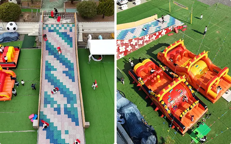 Aerial view of the colorful sled run and large inflatable obstacle course grounds.