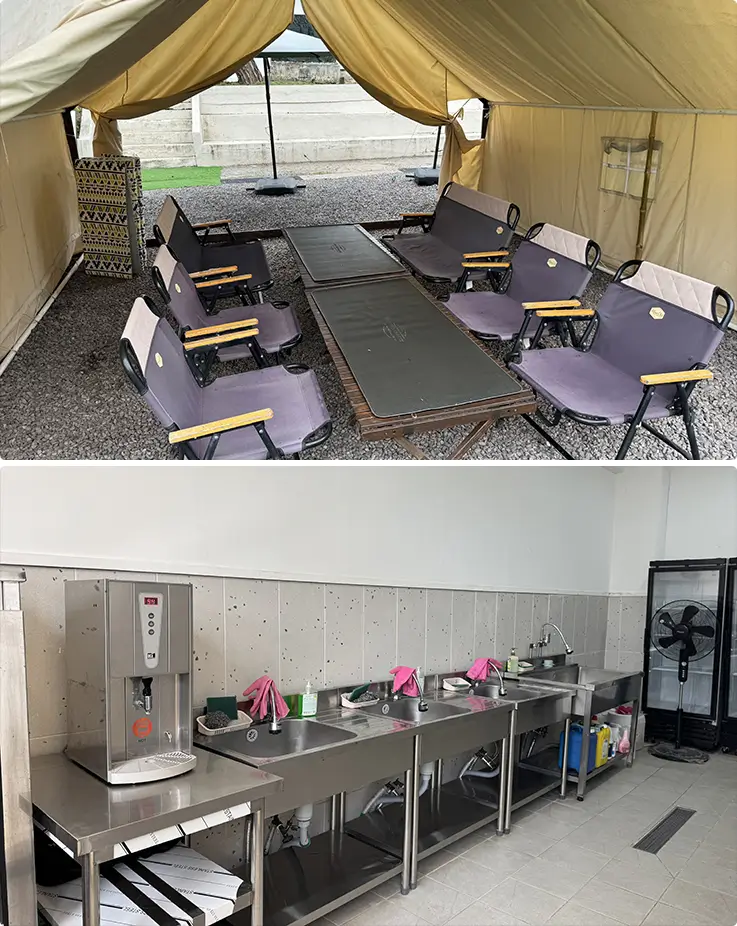 Spacious tent interior with seating and a well-equipped indoor dishwashing facility.