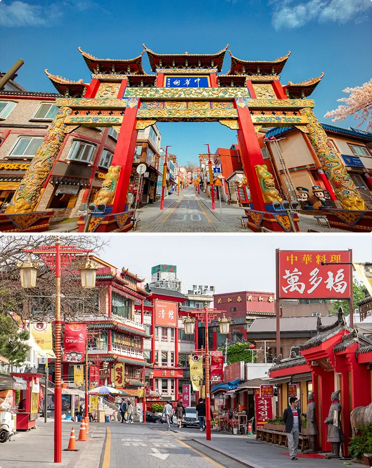 Incheon Chinatown's iconic ornamental gate and red lantern-lined street filled with Chinese-style storefronts.