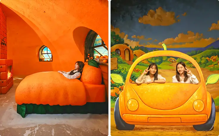 Visitors pose inside a whimsical giant orange bed and cheerful orange car.