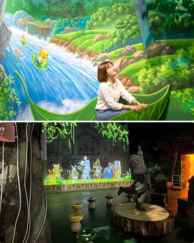 A guest rides a giant leaf down an animated forest waterfall scene.