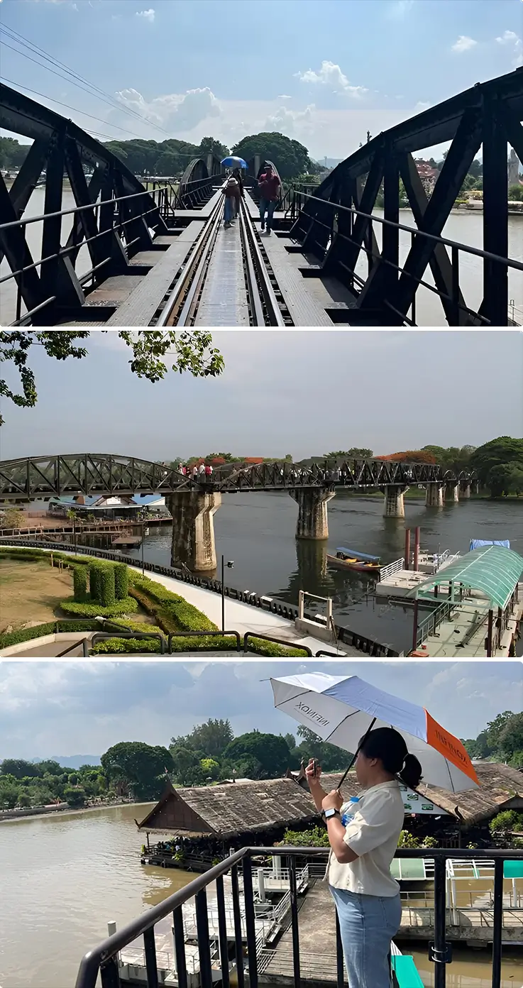 Visitors walking on the bridge and overlooking the River Kwai in Kanchanaburii