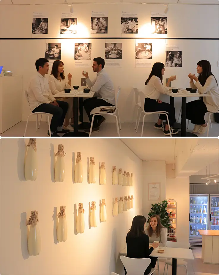 People enjoying makgeolli tasting at White Moon Gallery in Myeongdong