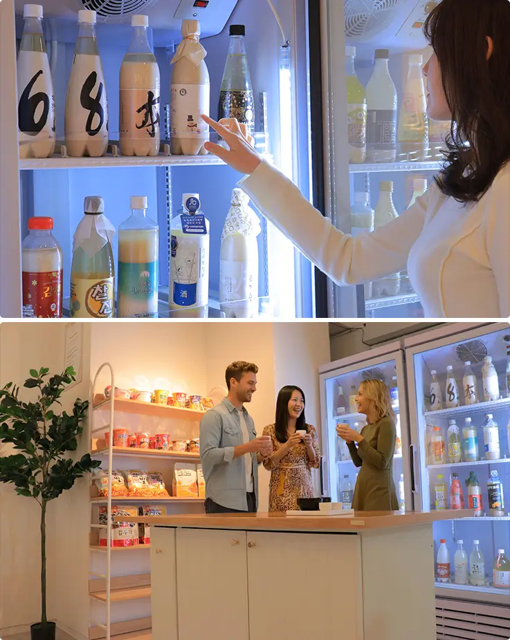 People enjoying over 60 premium makgeolli labels at White Moon Gallery in Myeongdong