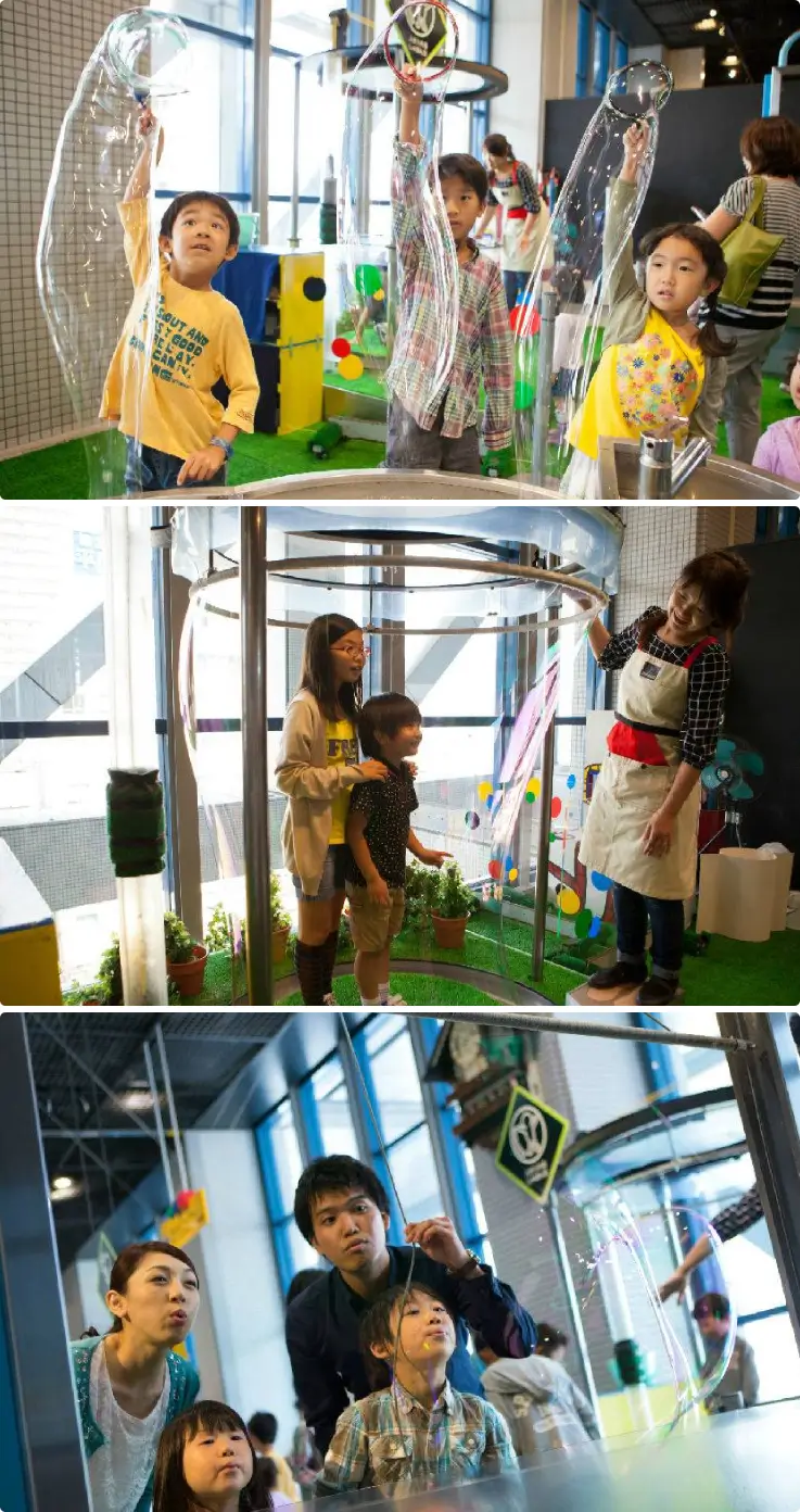 Families enjoying various playful activities at Kids Plaza Osaka