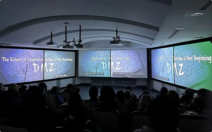 People watching videos at DMZ Theater & Exhibition Hall in Paju