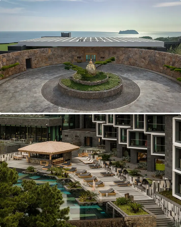 Stone courtyard entrance and pool terrace highlight JW Marriott Jeju's modern coastal architecture.