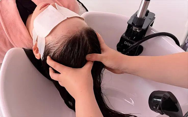 Relaxing scalp massage delivers premium, all-in-one Korean royal head spa care.