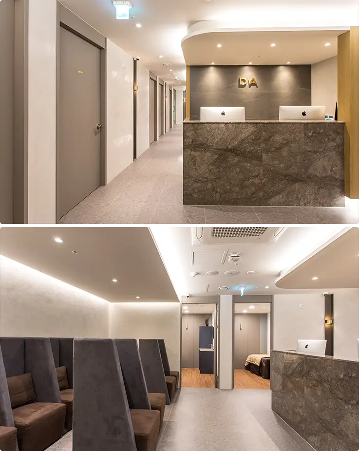 Elegant DA Clinic lobby featuring marble reception desk and comfortable waiting area.