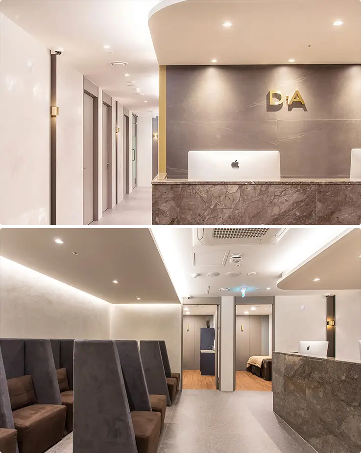 Elegant DA Clinic lobby featuring marble reception desk and comfortable waiting area.
