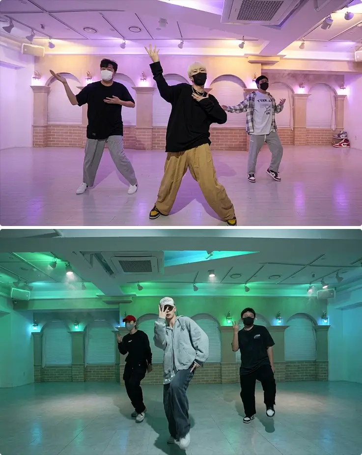Trainees strike confident K-pop poses inside a stylish, colorfully lit private dance studio.