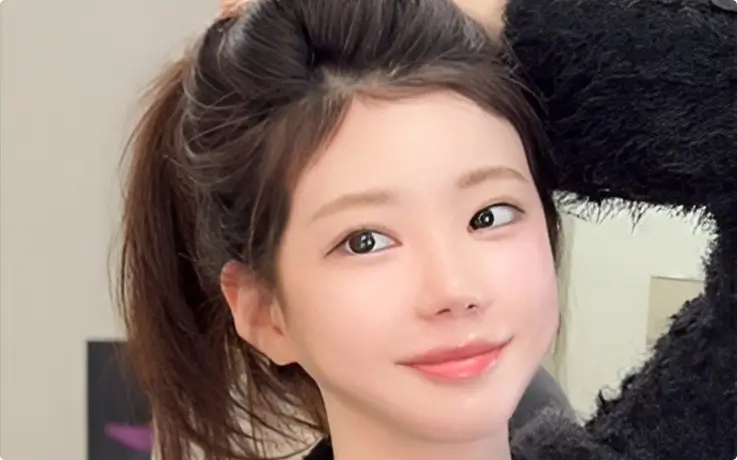 A woman getting the baby hair perm service at Dressmun in Seoul