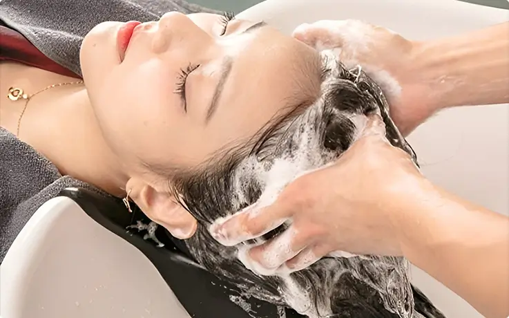 A person getting half scalp clinic service at Dressmun in Seoul