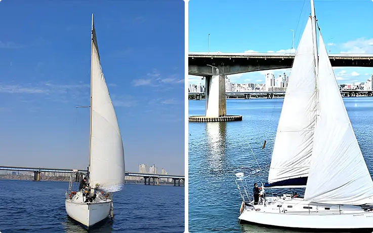 Mermaid sailing yacht gliding along the Han River with Seoul's bridges and city skyline in the background.