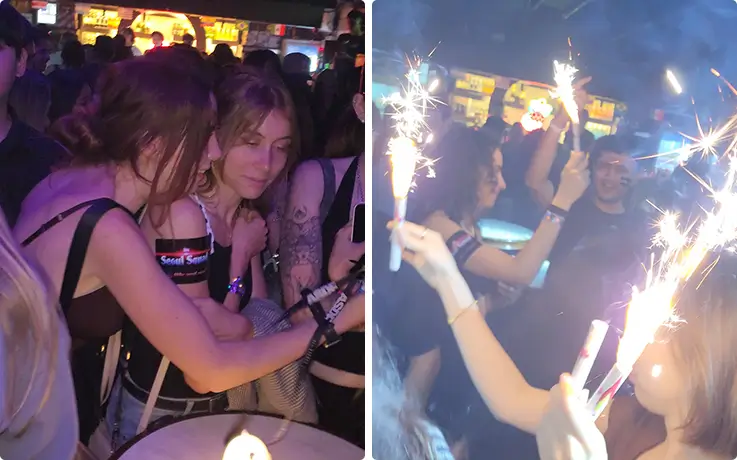 Guests celebrate with sparklers at a Hongdae club on the pub crawl.