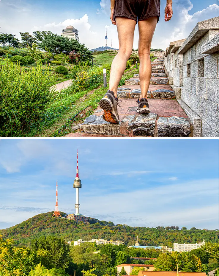 A person walking along the fortress path at Namsan Park