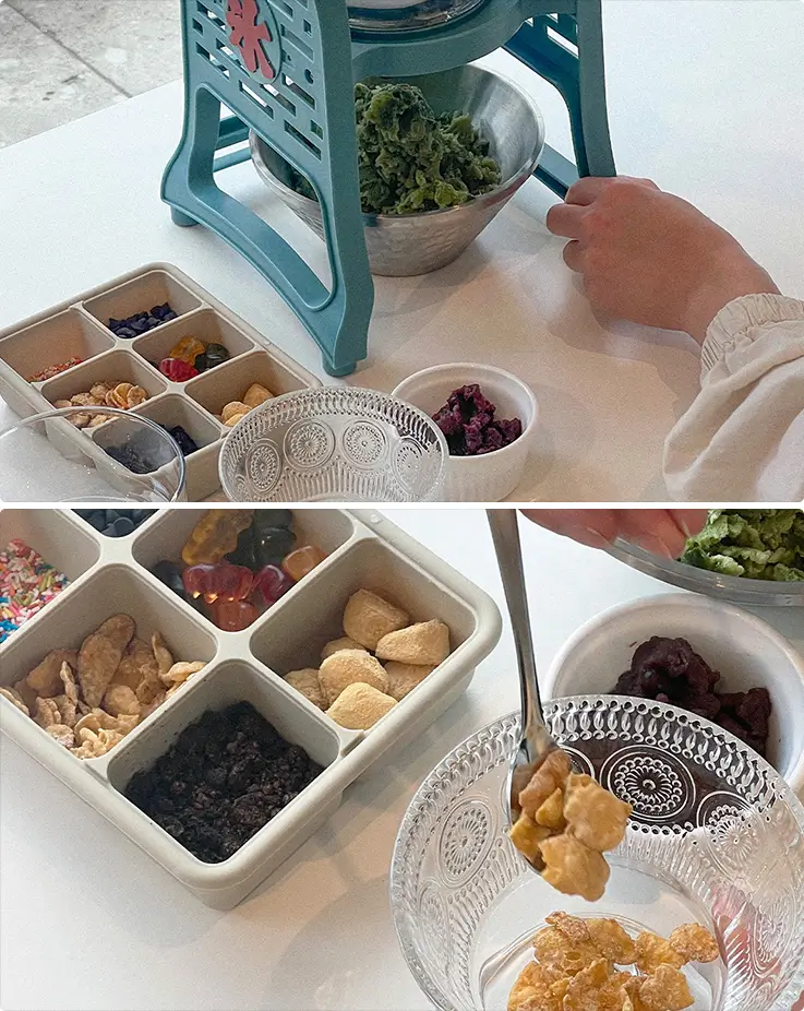 Choosing toppings like rice cakes, gummies, and dried fruit for a custom bingsu bowl.