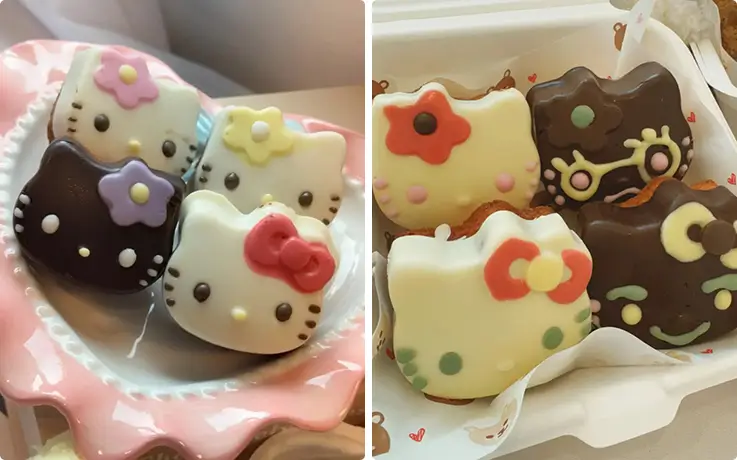 Hello Kitty madeleines decorated with colorful icing flowers, bows, and chocolate details.