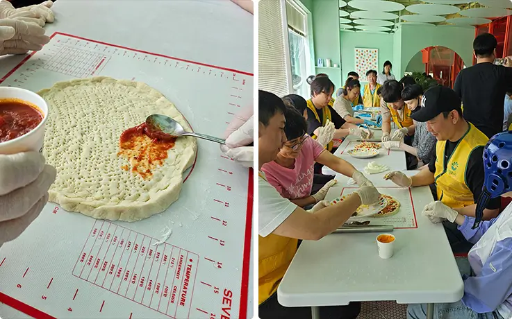 Participants spreading gochujang sauce on handmade pizza dough during K-food cooking class.