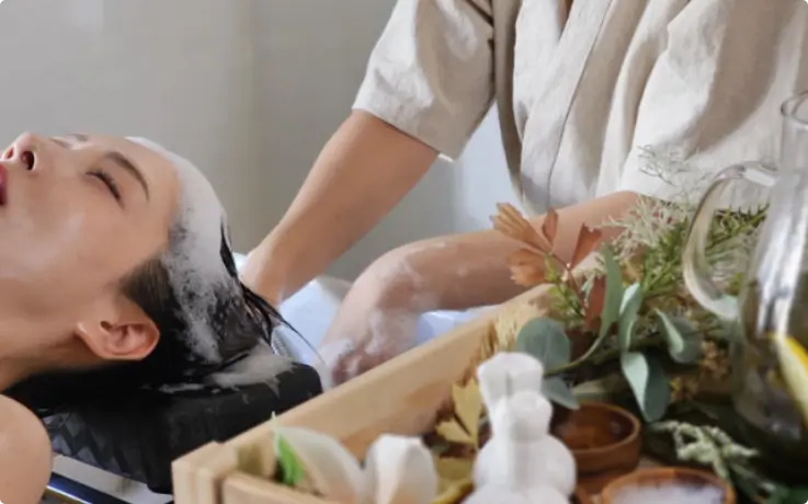 Guest receiving the Forest Emperor Head Spa treatment