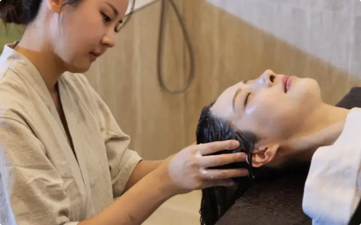 Guest receiving the Organic Healing Head Spa treatment
