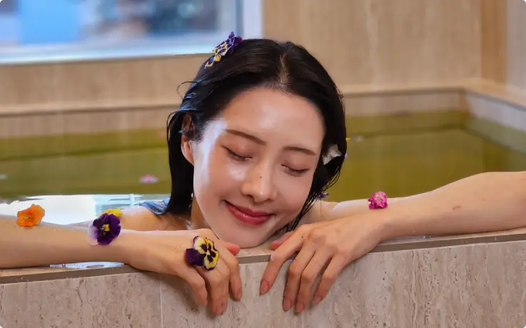 Guest soaking in a warm bath