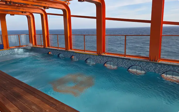 Outdoor infinity pool on PanStar Miracle Cruise with ocean views