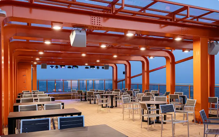 The outdoor deck of PanStar Miracle Cruise with sea views