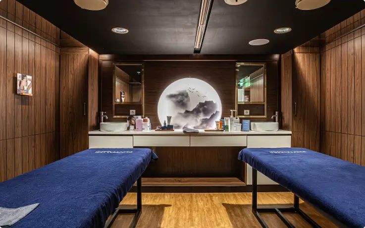 Interior of the wellness center on PanStar Miracle Cruise with massage and relaxation areas