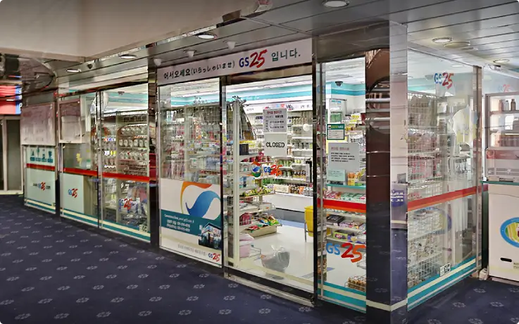 Convenience store selling Korean snacks and daily essentials on the Pukwan Ferry.