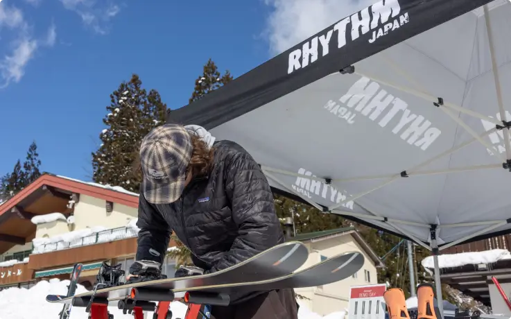 Staff maintaining equipment at Rhythm Wadano Hakuba ski rental shop