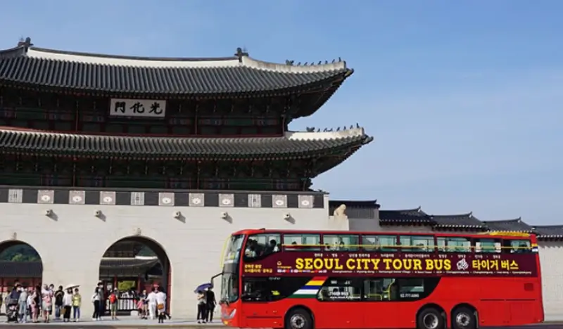 Seoul city tour bus passing major landmarks and attractions in downtown Seoul