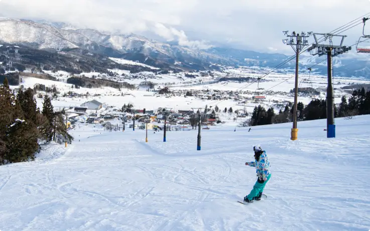 Panoramic snowy slope at Togari Onsen Ski Resort, Nagano.