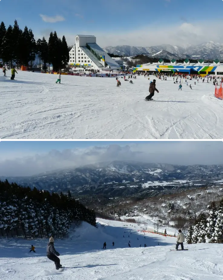 Panoramic view of Washigatake Ski Resort's wide, snow-covered slopes surrounded by mountain scenery.