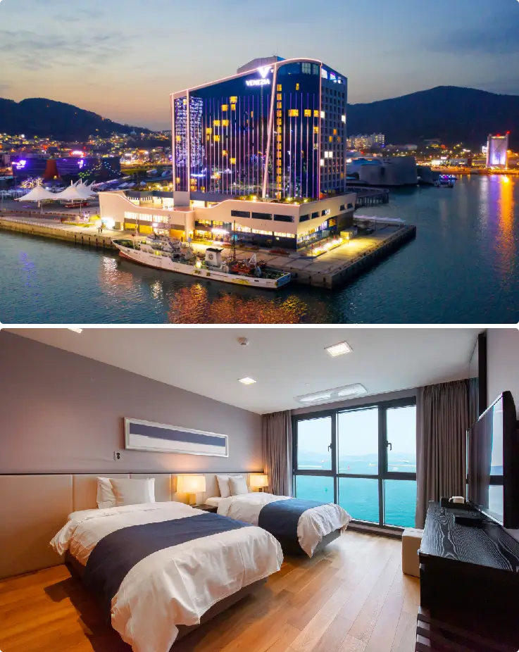 Exterior view of Yeosu Venezia Hotel & Resort with modern architecture and ocean backdrop.